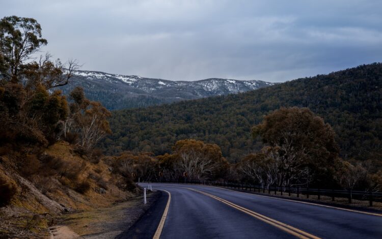 open winter road with scenic mountains