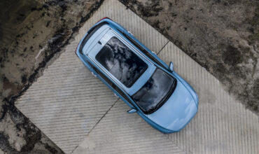 aerial view of blue electric car