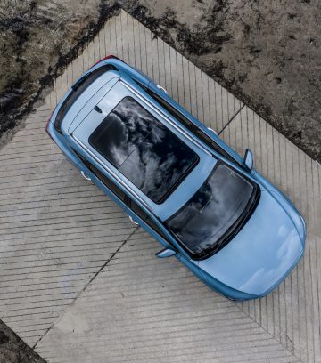 aerial view of blue electric car
