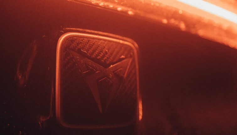 EV close up image of car logo