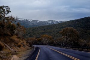 open winter road with scenic mountains