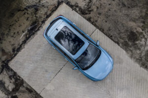 aerial view of blue electric car