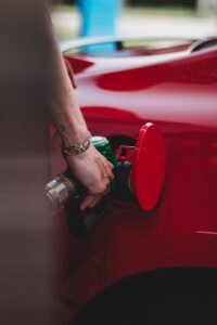close up of putting petrol into a car