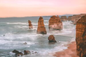 scenic image of the 12 apostles at sunrise with haze around the rocks