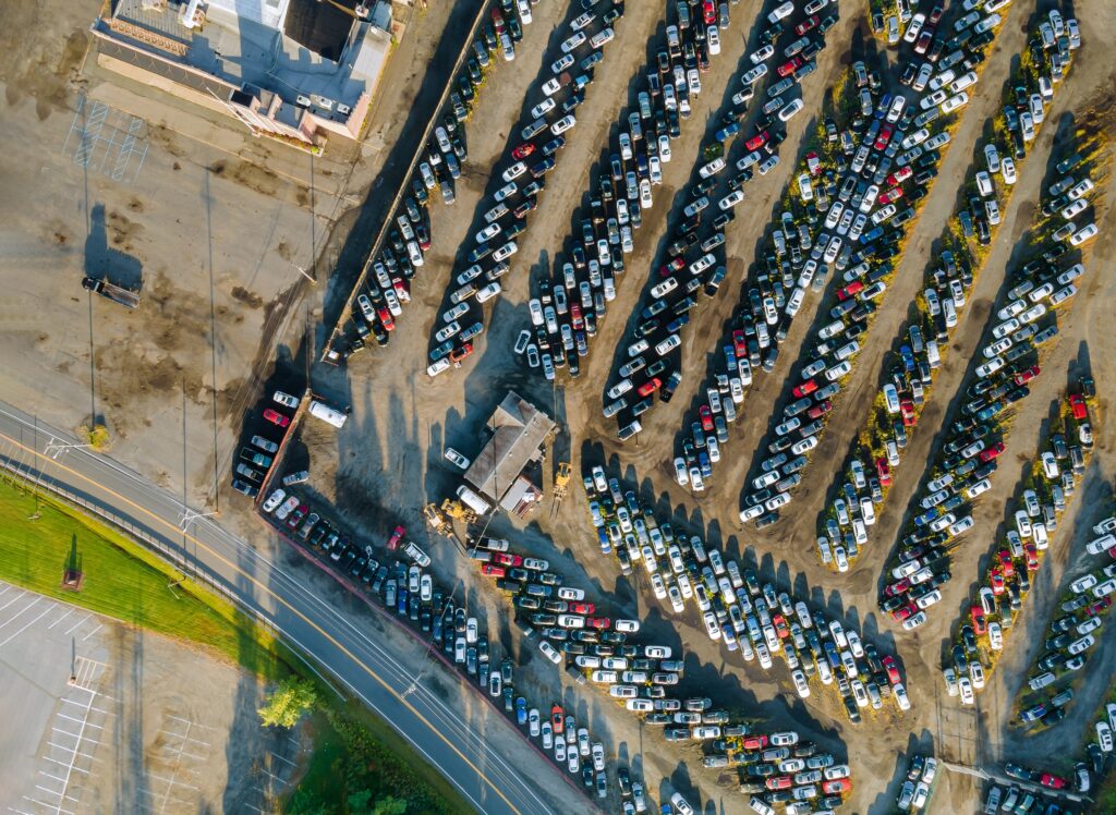 aerial view of used cars for sale at an auction