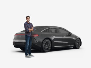 man standing in front of a black mercedes benz