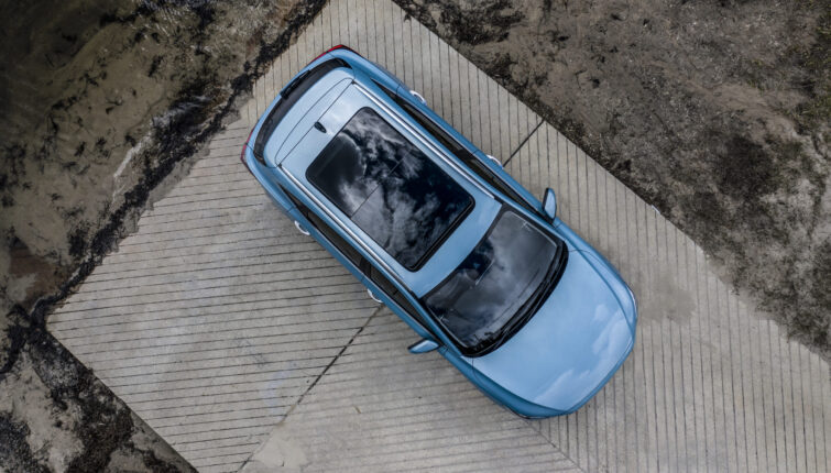 aerial view of blue electric car