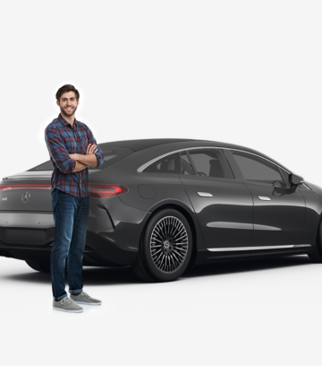 man standing in front of a black mercedes benz