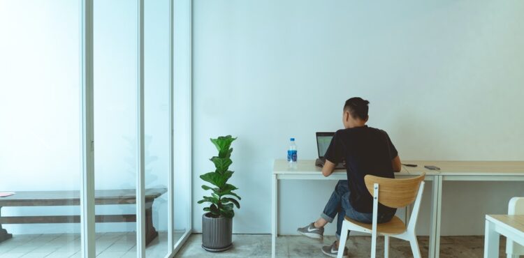 men working on car finances alone