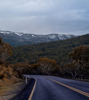 open winter road with scenic mountains