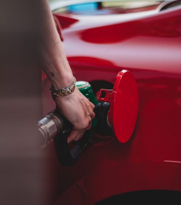 close up of putting petrol into a car